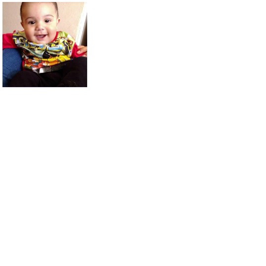 Smiling Baby on Blue Cushion
