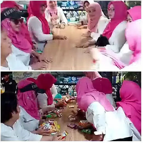 Women Sharing Snacks at Table