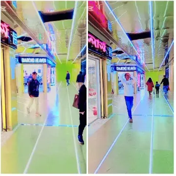 Busy Shopping Mall with Neon Lights