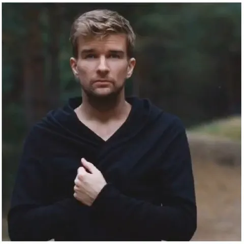 Outdoor Man Holding Sweater