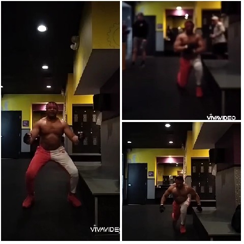 Man Exercising in Dim Gym