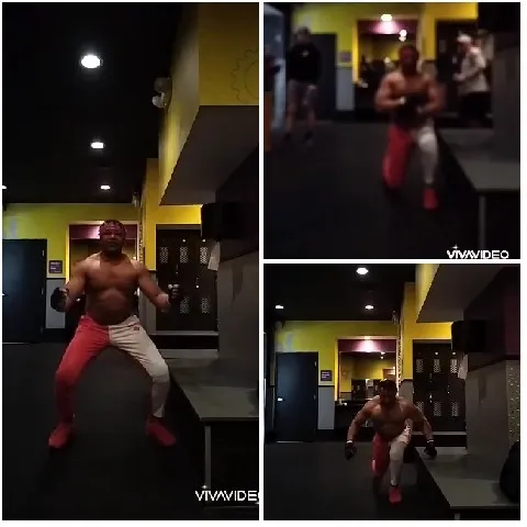 Man Exercising in Dim Gym