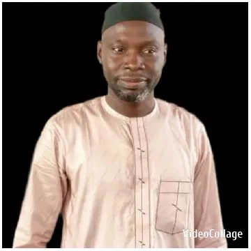 Man in Traditional Outfit on Black