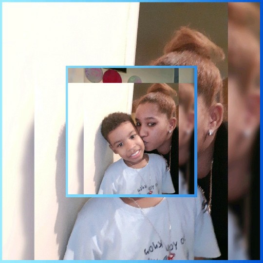 Affectionate Kiss Between Mother and Child
