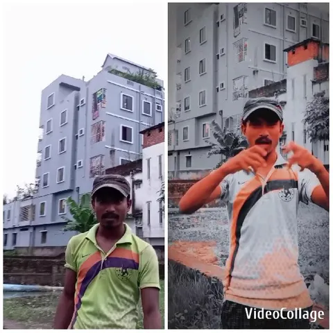 Man in Green Shirt by Building