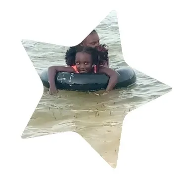 Children Playing in Water at Beach