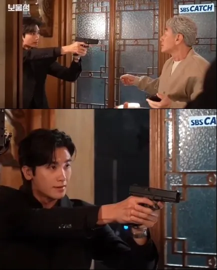 Young Man Aiming Handgun