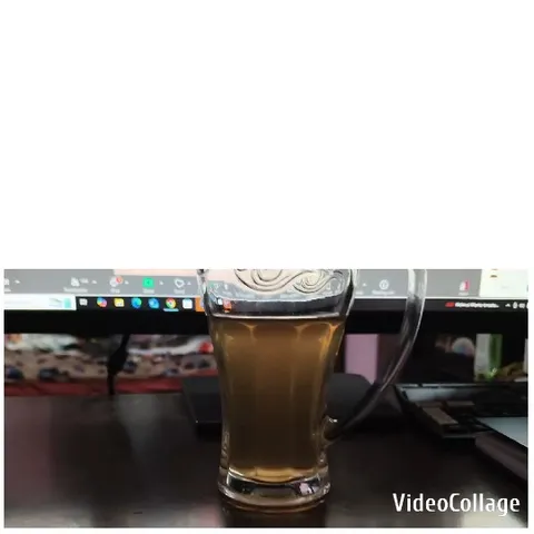 Person with Drinks Against Curtain