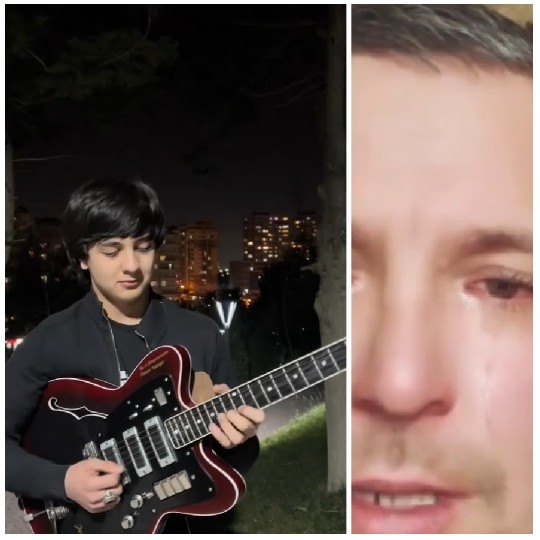 Guitar Playing Under City Lights