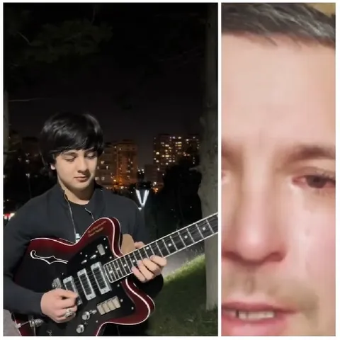 Guitar Playing Under City Lights