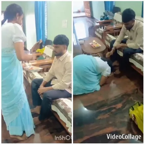 Woman Hands Item to Seated Man