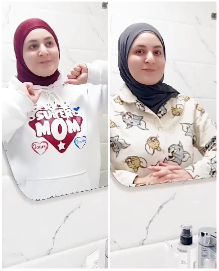 Two Hoodies in Bathroom Mirror