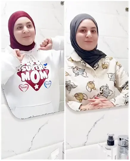 Two Hoodies in Bathroom Mirror