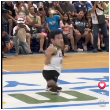 Basketball Player and Cheerful Crowd
