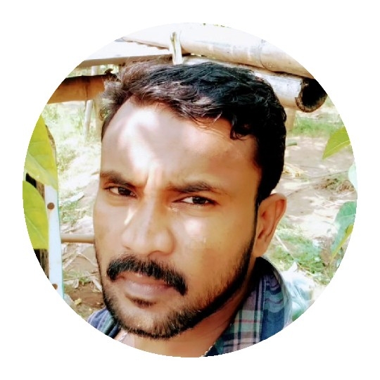 Man Outdoors With Circular Frame