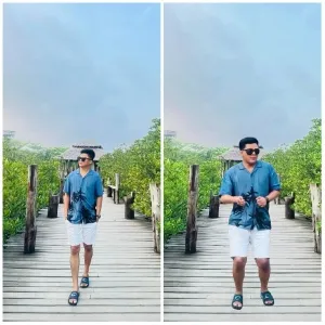 Man Walking on Wooden Path
