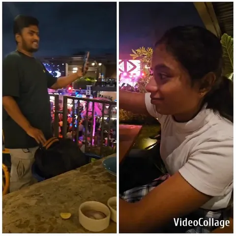Man with Phone and Smiling Woman