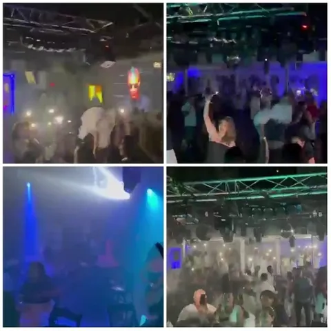 Crowd Dancing at Nightclub Event