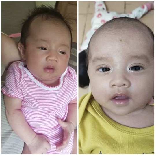 Two Babies in Different Outfits