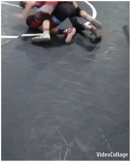 Wrestling Match on Gym Mat