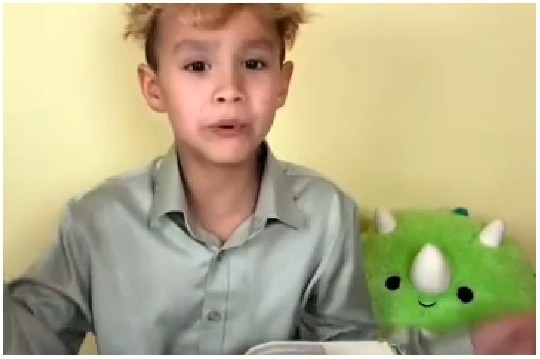 Child with Dinosaur Plush Toy