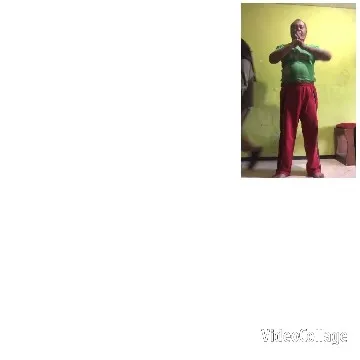 Person Exercising Indoors Against Green Wall