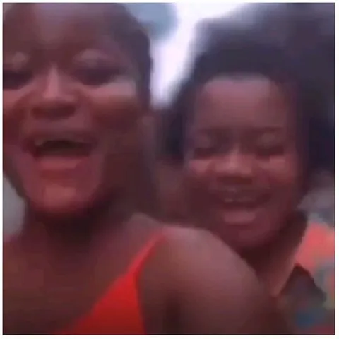 Two People Smiling Together