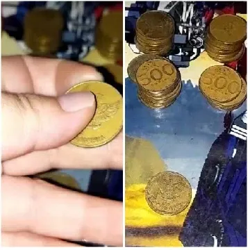 Hand Holding Coin and Stacks
