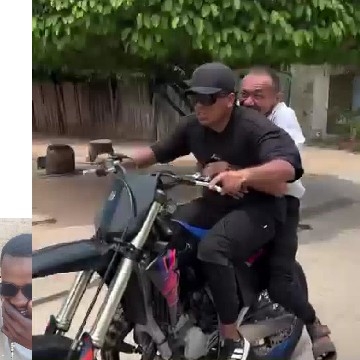 Riding Motorcycle on City Street