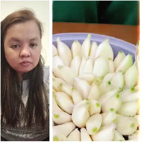 Person with Striped Shirt and Garlic Bowl