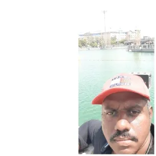 Man Taking Selfie by Water