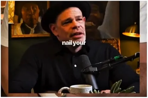 Man Speaking in Cozy Room