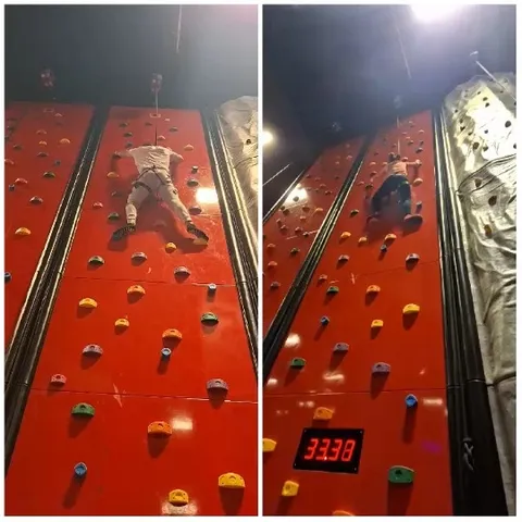 Climbers on Colorful Indoor Wall