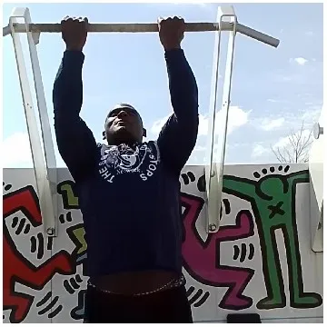 Person Doing Pull-Up Outdoors
