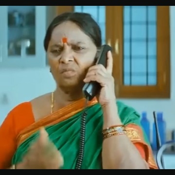 Elderly Woman in Traditional Saree
