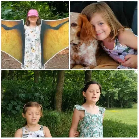 Child with Butterfly Wings and Dog