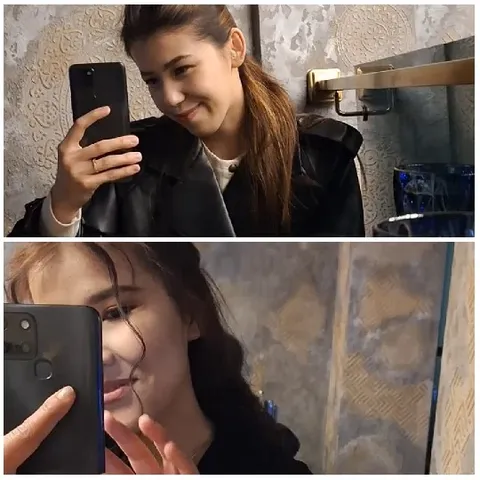 Women Taking Selfies in Bathroom