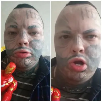 Person with Facial Tattoos and Toy