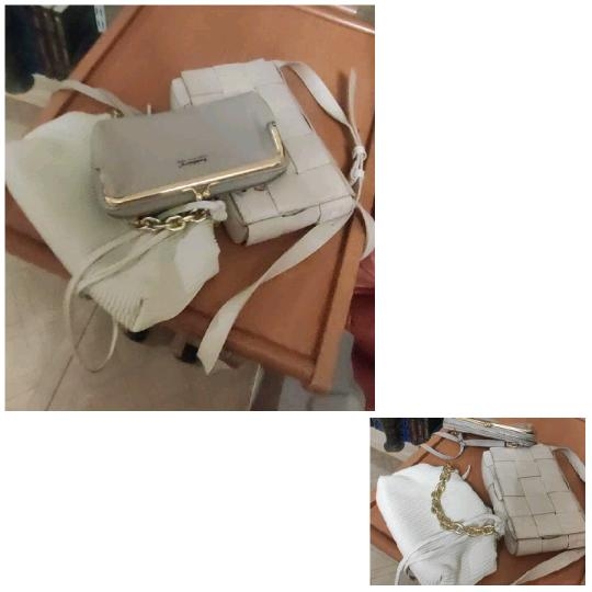 Handbags and Sweater on Table