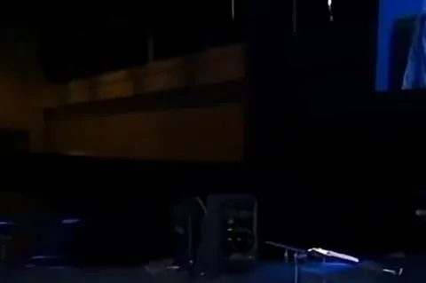 Dimly Lit Stage With Equipment