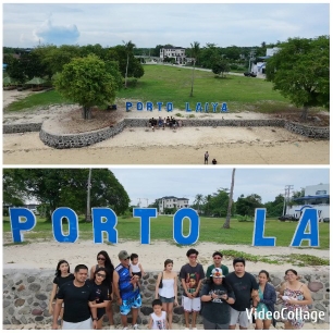 Group at Porto Laiya Sign