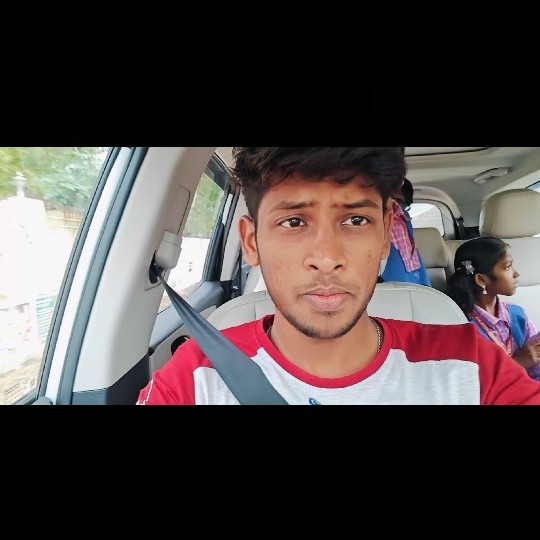 Person in Car with Child Looking Out
