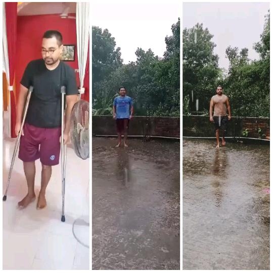 Man with Crutches in the Rain