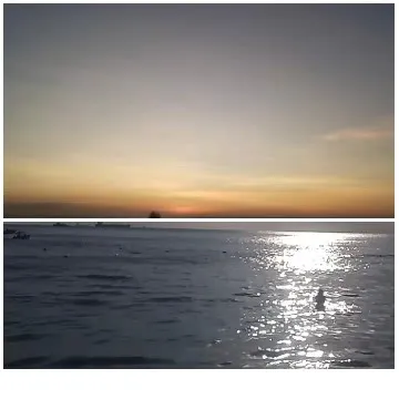 Serene Ocean Sunrise Reflection