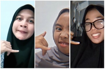 Women Making Phone Gestures