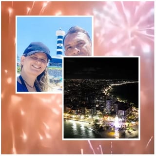 Smiling Couple with Night Cityscape