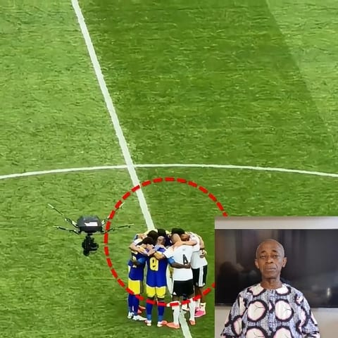 Soccer Players in Huddle Before Match