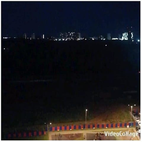 Nighttime Cityscape with Bright Lights