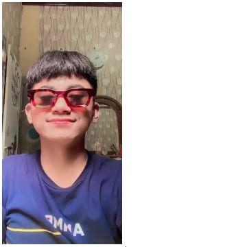 Person with Sunglasses in Indoor Setting