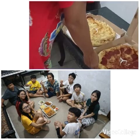 Person with Pizzas and Group Gathering